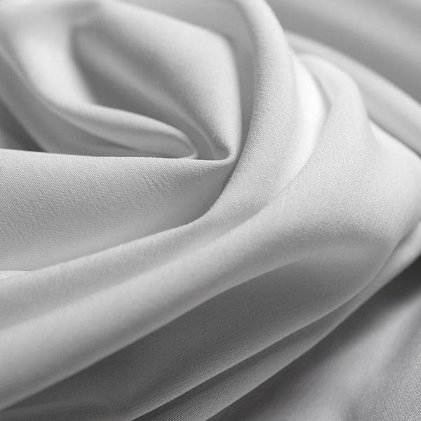 Close-up of White contract fabric sample for care home interiors