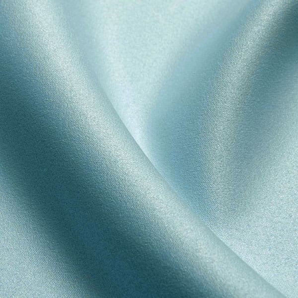 Close-up of Aqua contract fabric sample for care home interiors