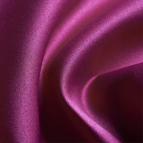 Close-up of Fuschia contract fabric sample for care home interiors