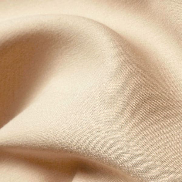 Close-up of Stone contract fabric sample for care home interiors