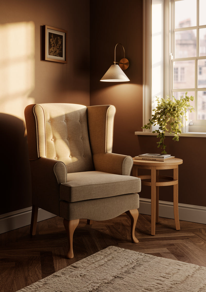 Anderson wingback armchair for an elderly care lounge shown in a styled room setting