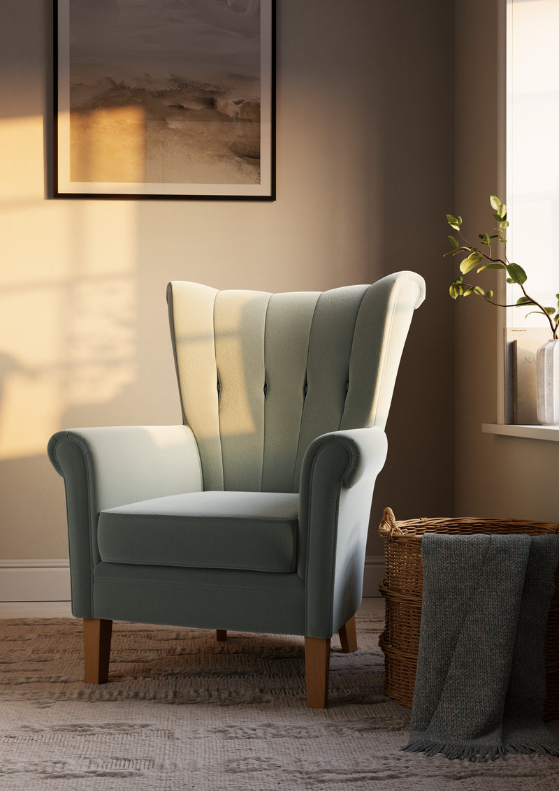 Collette high-back armchair for an elderly care lounge shown in a styled room setting