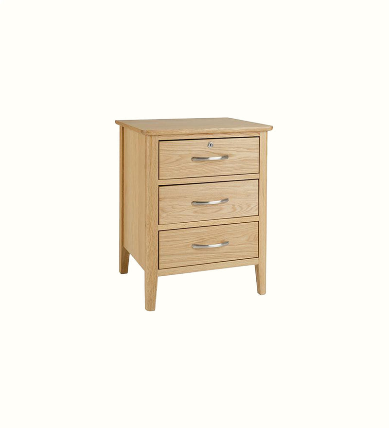 Portland three-drawer bedside table for a care home bedroom