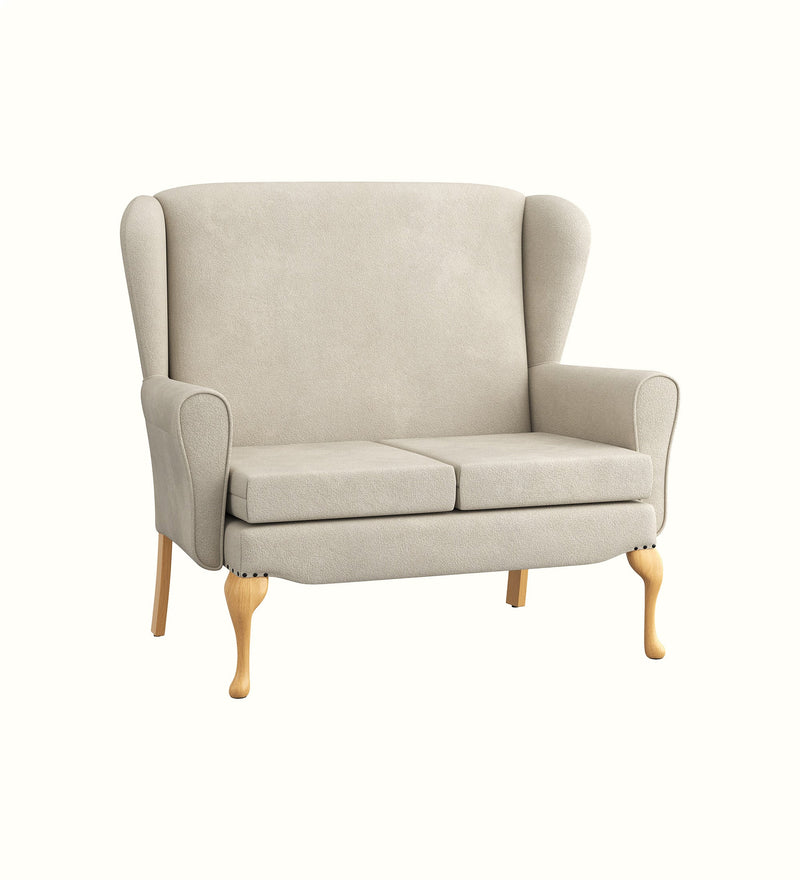Bentley wingback two-seater sofa with Queen Anne legs for an elderly care lounge