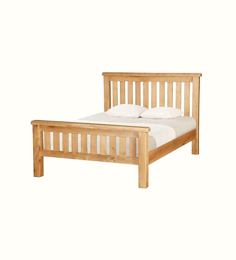 Care bed base for a care home bedroom