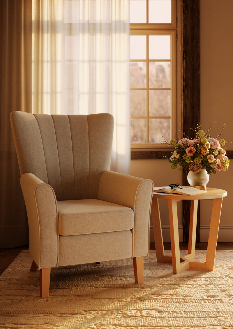 Fluted high-back armchair for an elderly care lounge shown in a styled room setting
